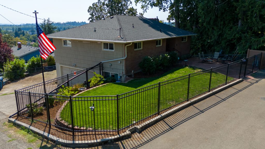 Aerial image of house for sale, a US flag on the left